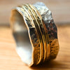 Drehring Silber trifft Gold "Yaffa" mit drei Außenringen