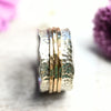 Drehring Silber trifft Gold "Yaffa" mit drei Außenringen