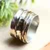 Breiter Silberring "Rachel" mit drehbaren Ringen aus Gold und Silber
