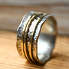 Drehring Silber trifft Gold "Yaffa" mit drei Außenringen