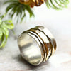 Breiter Silberring "Rachel" mit drehbaren Ringen aus Gold und Silber