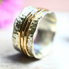 Drehring Silber trifft Gold "Yaffa" mit drei Außenringen