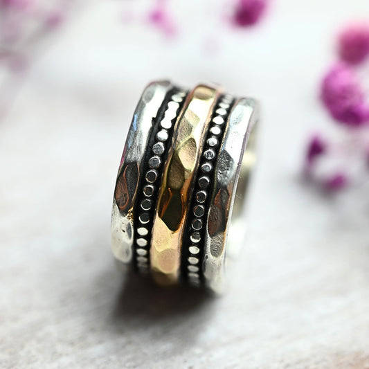 Massiver Drehring "Ronia" aus 925er Silber und 333er Gold