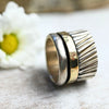 Breiter Bicolor Silberring "Nirit" mit drehbarem goldenen Außenring