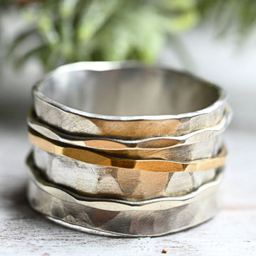 Breiter Silberring "Rachel" mit drehbaren Ringen aus Gold und Silber